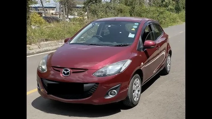 Renting a Car in Nairobi Kenya - Mazda Demio for Hire in Membley