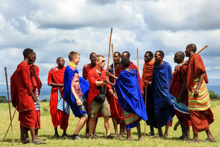 Hot-air balloon ride- tourists interacting with Masai Morans