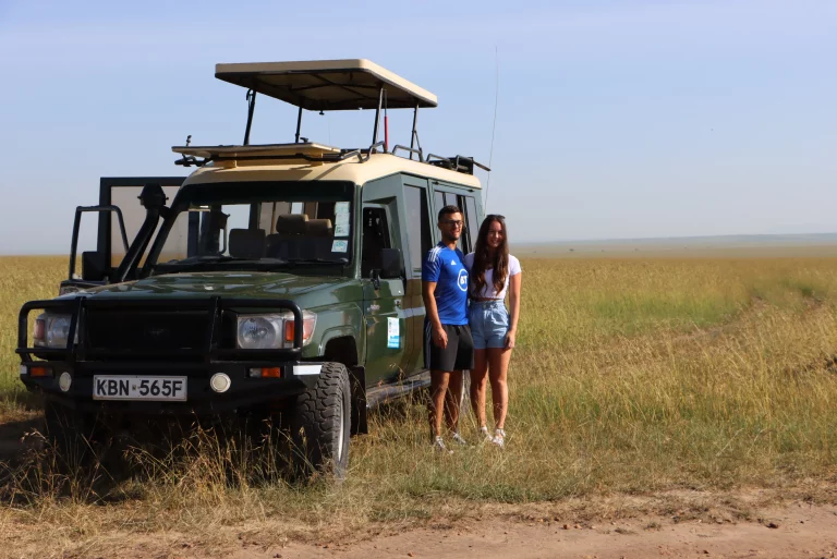 Hot-air balloon game- tourists on a game drive in the Mara