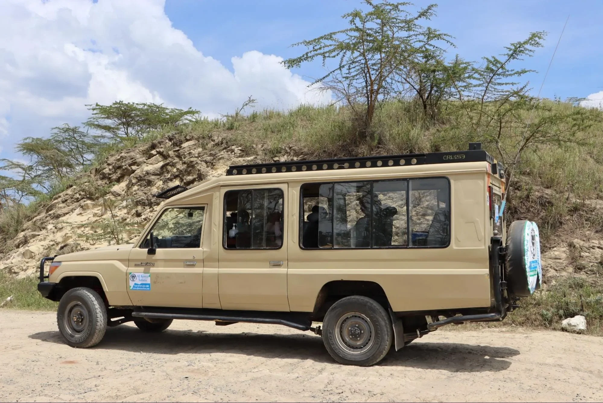 A Landcruiser Safari Jeep during a game drive in Masai Mara Kenya