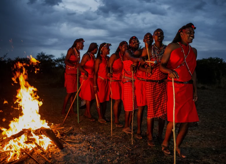 Best time to visit Kenya-masai morans dance around a fire