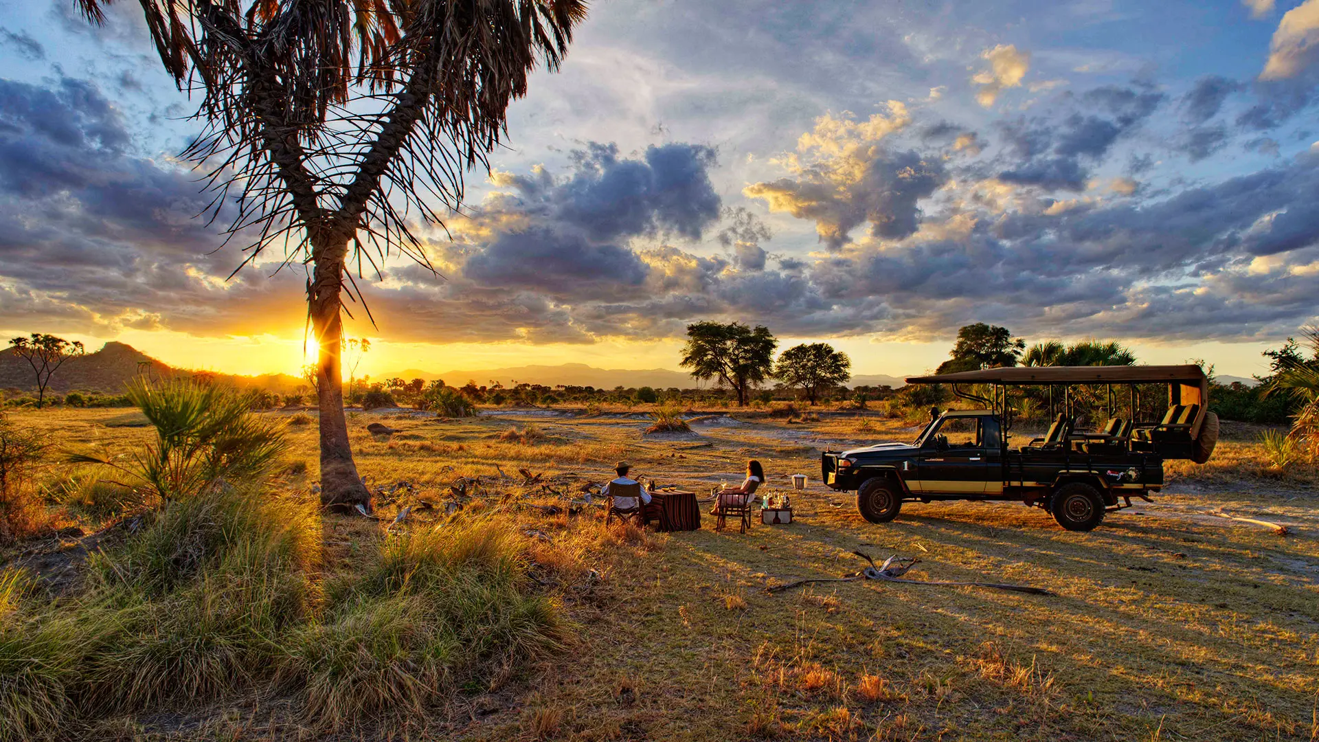 Relaxing Kenya holiday safaris at Meru National Park - Bush dining by Elsa’s Kopje