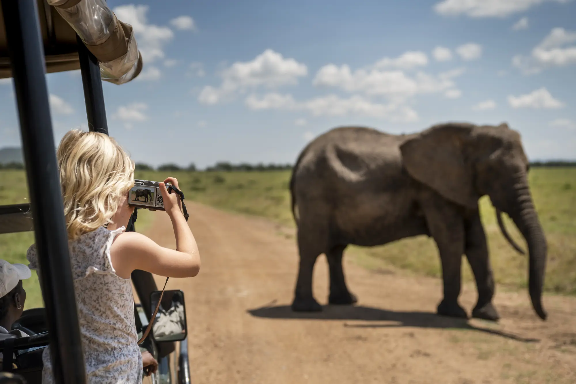 A family enjoying a safari tour in Kenya