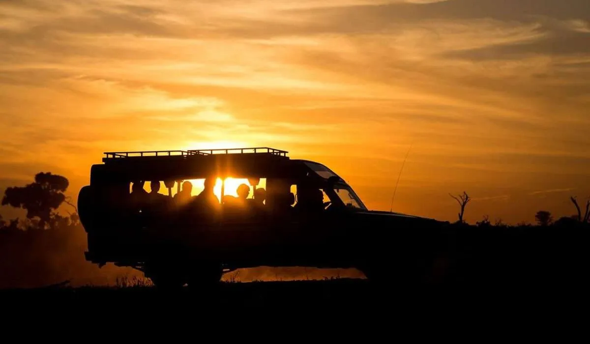 What to do on 3 days Masai Mara camping safari - safari jeep going an evening game drive