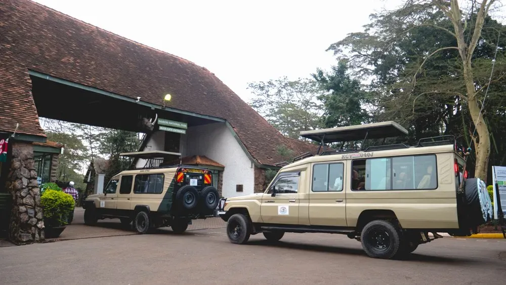 Nairobi National Park car entry fee guidelines - safari vans at the Nairobi National Park entrance