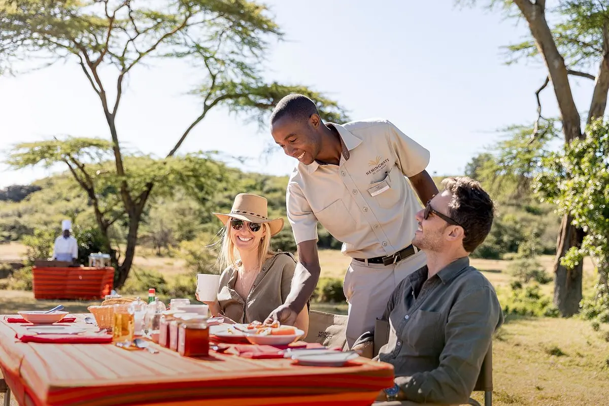 A family enjoying a private safari in Kenya - Bush Breakfast