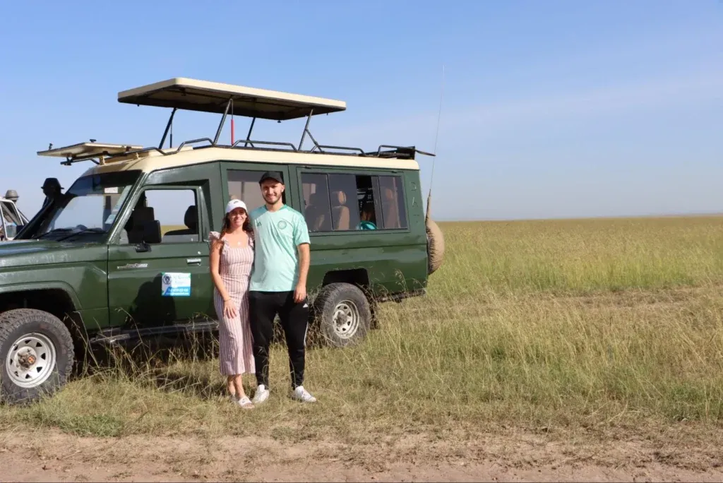 Honeymoon Safari Kenya price - a couple in the Masai Mara